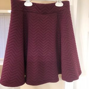 Purple flare skirt with chevron pattern